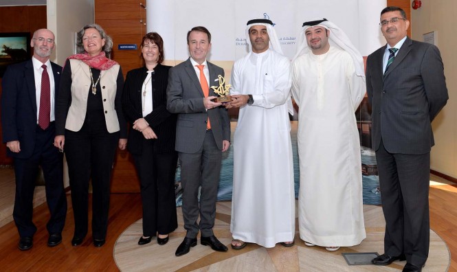 Amer Ali, Executive Director, DMCA, giving the Authority’s shield to Prof Dr. Hans-Jorg Schmidt-Trenz, CEO, Hamburg Chamber of Commerce and the accompanying delegation at the headquarters of Dubai Maritime City Authority