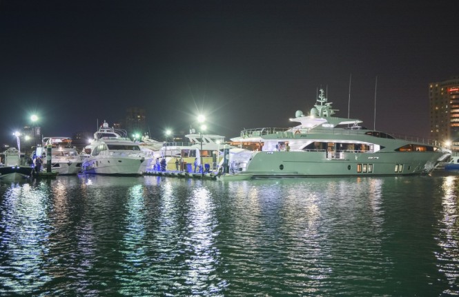 Night shot of the Gulf Craft fleet at the Kuwait Yacht Show 2015