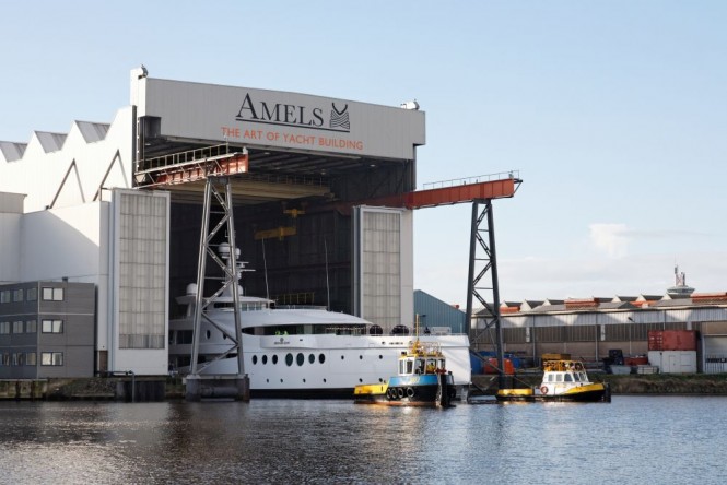 AMELS 199 super yacht MADAME KATE leaving her shed