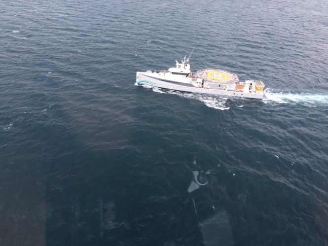 Damen Sea Axe superyacht support vessel Umbra with helicopter deck