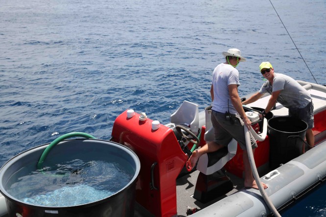 Filling the tenders of Dragonfly superyacht