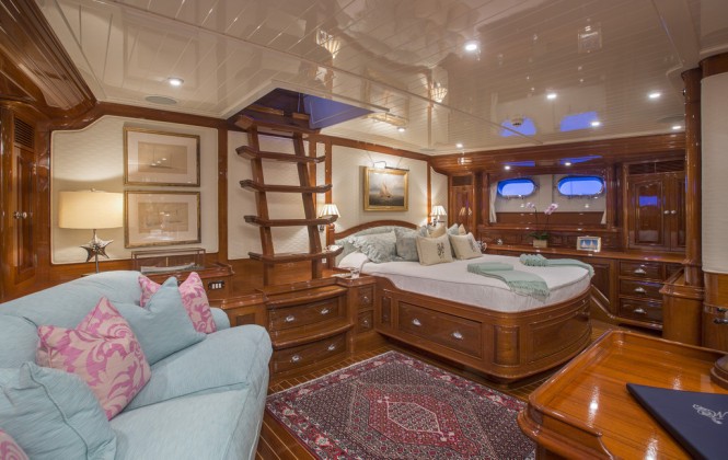 Whisper sleeps six guests comfortably in its three spacious staterooms. The master suite (left) includes an office area and a private companionway.  (Photo Courtesy of Whisper) 