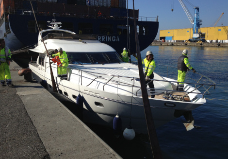 Princess 23M Yacht ISABEL being loaded on to a ship in Genoa, Italy