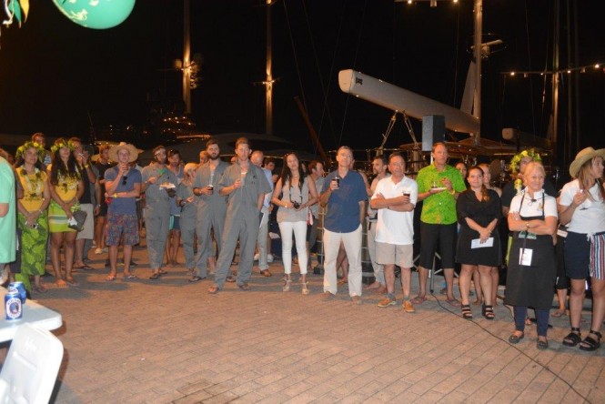 Crew from yachts cruising the region gather in Marina Taina to hear the announcement