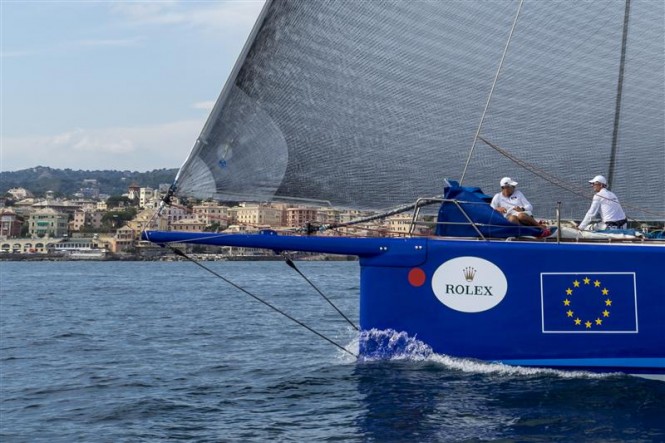 ESIMIT EUROPA 2 Yacht approaching the finish line in Genoa - Photo by Rolex Carlo Borlenghi