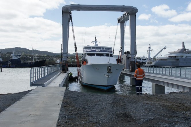 100′ Broward Superyacht being lifted on new 100 tonne travelift at Port Whangarei Marine Centre, South Shipyard, Port Whangarei, New Zealand