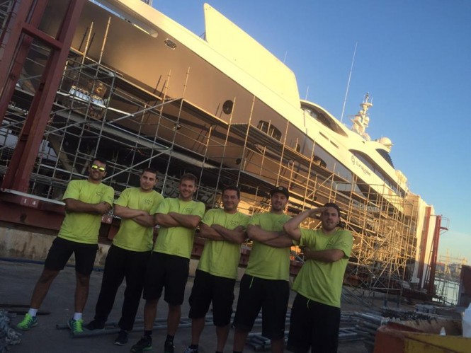 Wild Group team on completion of full hull wrap and colour change of Superyacht Turquoise