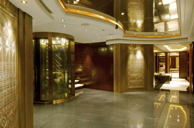 Luxury yacht KISMET - Lift with detailed golden decoration panels