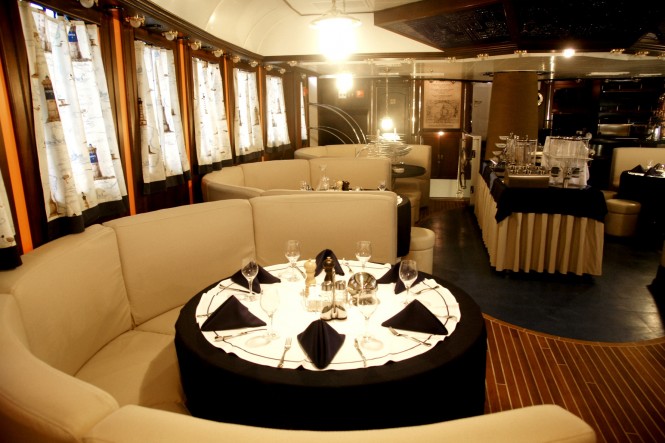 Formal dining aboard superyacht RUNNING ON WAVES