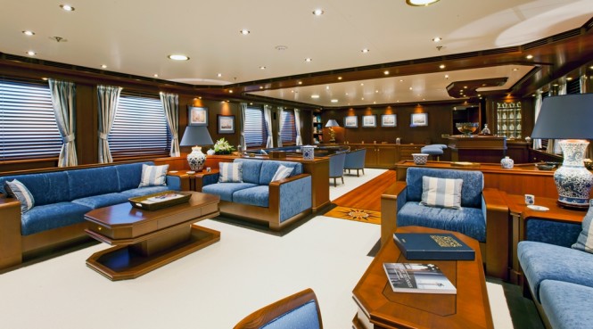 Main salon, dining area and bar aboard explorer yacht AXANTHA II