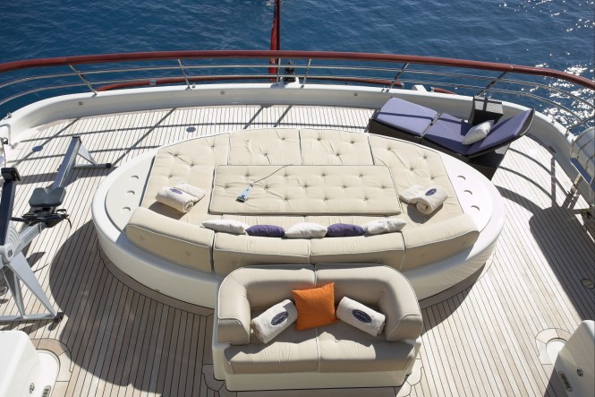 Sunpads and massage water bed on the upper deck aft of motor yacht DENIKI