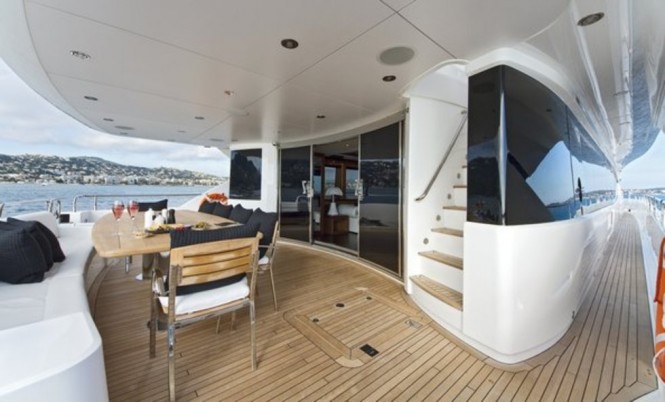 Alfresco dining on the aft deck of luxury yacht BLACK AND WHITE