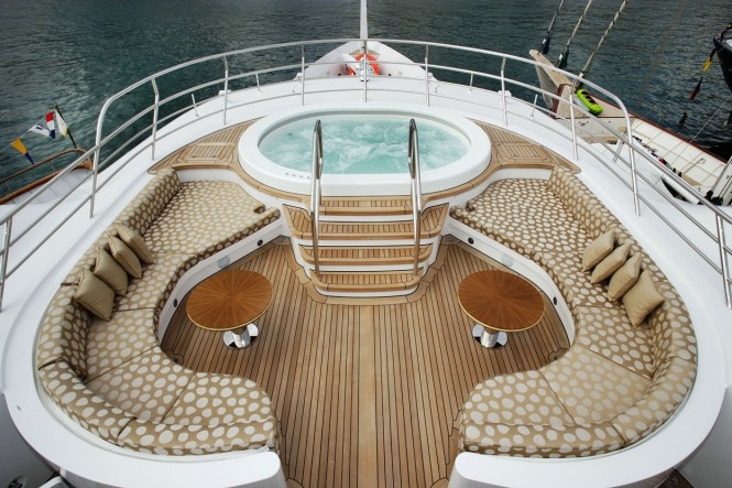 Inviting sun deck with a Jacuzzi to watch amazing horizons from aboard MINE GAMES