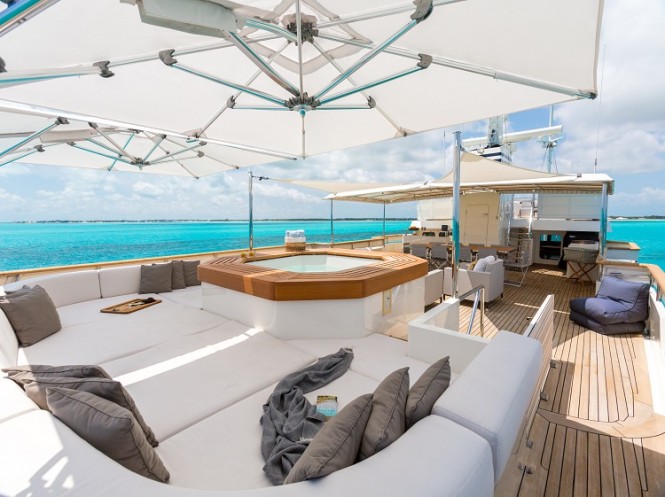 Lower sundeck on PIONEER with Jacuzzi and sunloungers