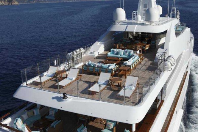 Sundeck and upper deck aft aboard luxury yacht RAMBLE ON ROSE. Photo credit: CRN