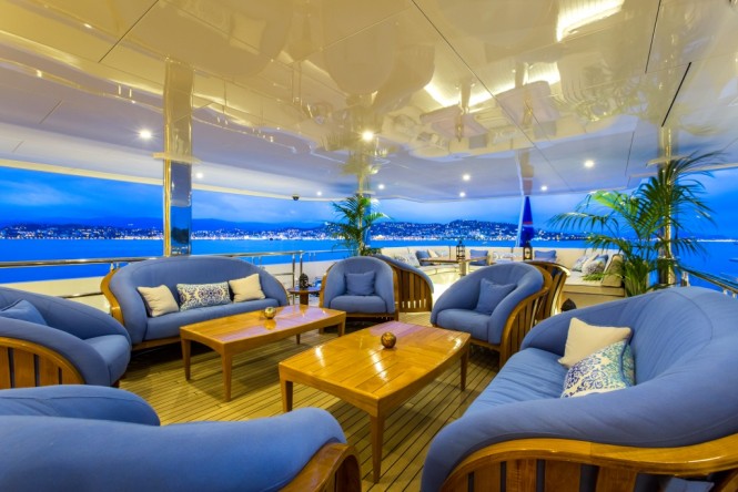 The outdoor lounge on the main deck aft aboard motor yacht SEANNA