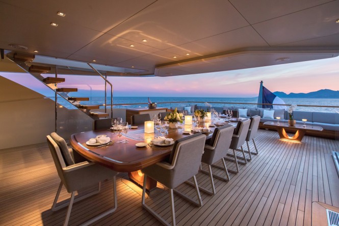 Al fresco dining at sunset aboard VERTIGE yacht