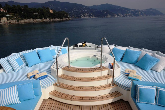 Jacuzzi and sunpads on the sundeck of luxury yacht HANA