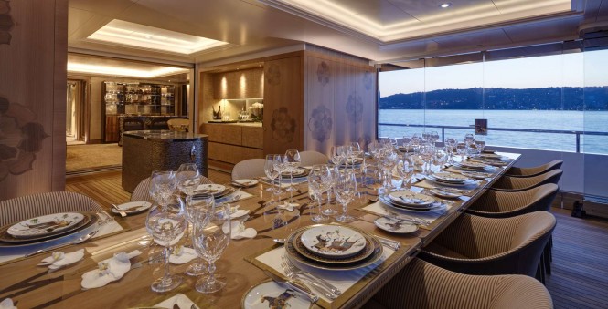 Motor yacht JOY - Exceptional woodwork surrounding the formal dining room. Image credit Feadship
