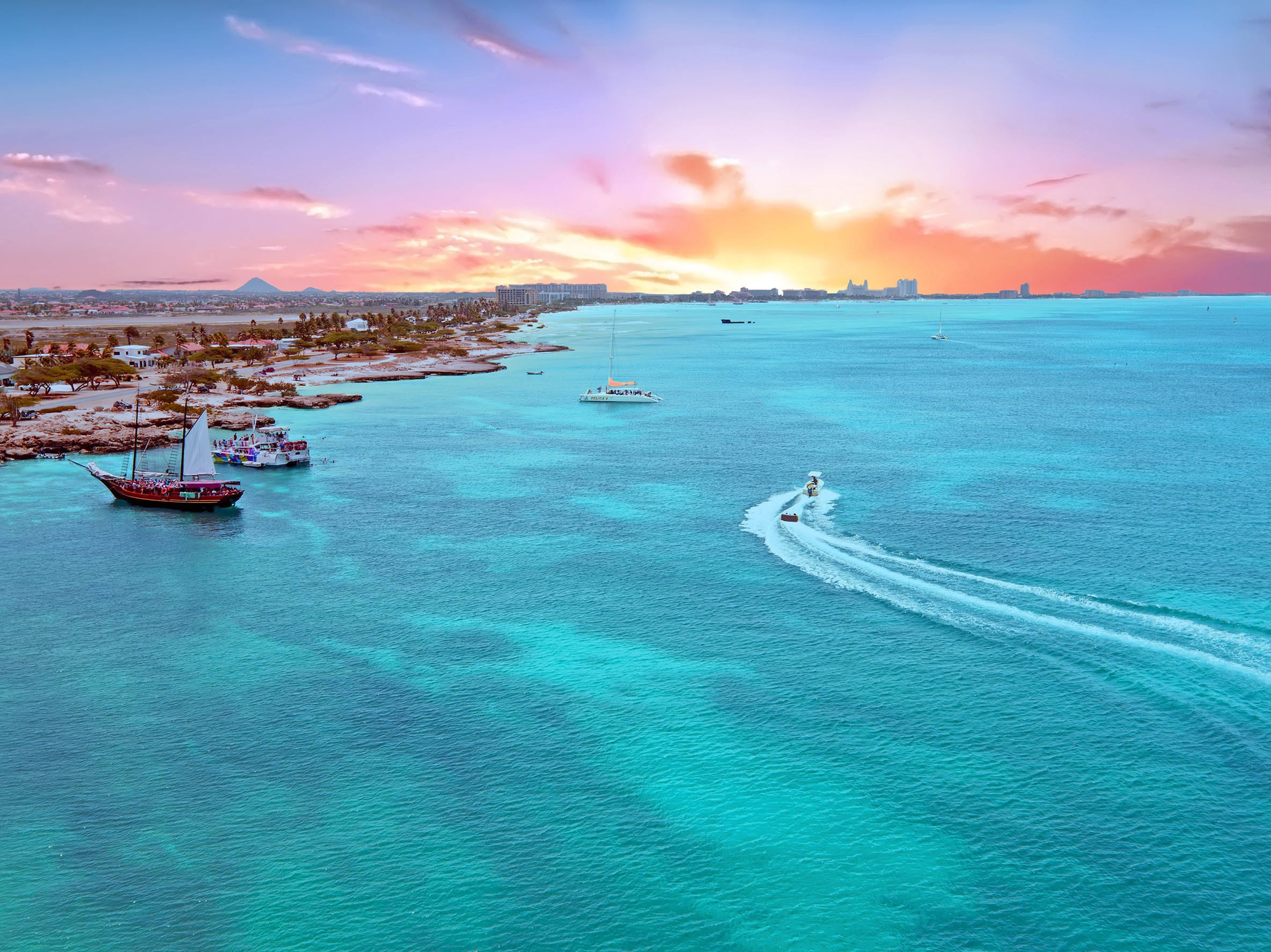 Aerial from Aruba island in the Caribbean Sea at sunset — Yacht Charter ...