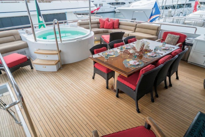Luxury yacht NICOLE EVELYN - Upper deck dining and Jacuzzi