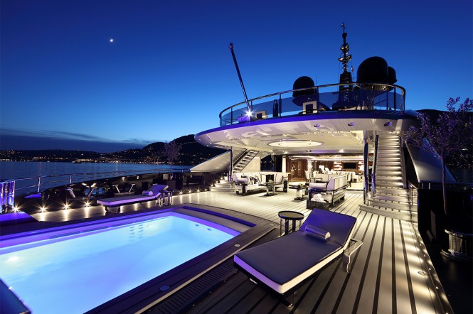 Mega yacht OKTO - Main deck aft pool and sun loungers