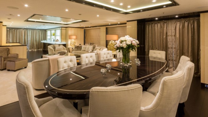 Luxury yacht ELIXIR - Main salon and formal dining area with Makassar wood furnishings