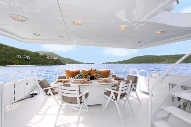 Main deck aft alfresco dining aboard M/Y INSATIABLE