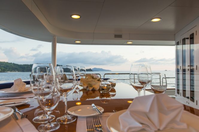 Alfresco dining on the main deck aft of luxury yacht NORTHERN SUN
