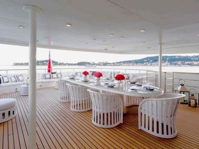 Alfresco dining on the upper deck of luxury yacht MISCHIEF