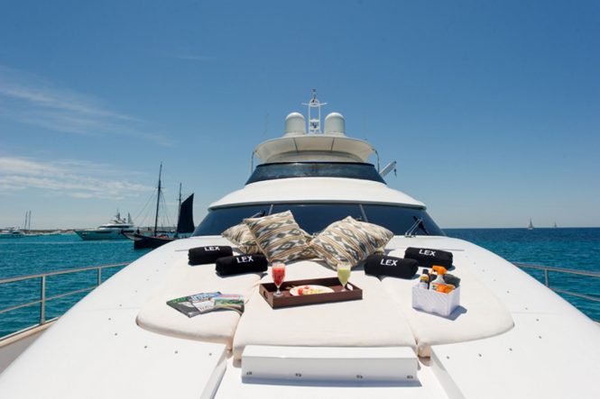 Bow sunbathing aboard luxury yacht LEX