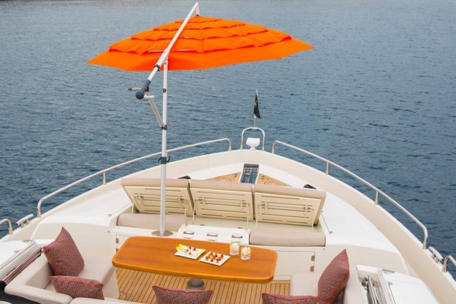 Bow sun loungers and Portuguese deck aboard luxury yacht FIRECRACKER