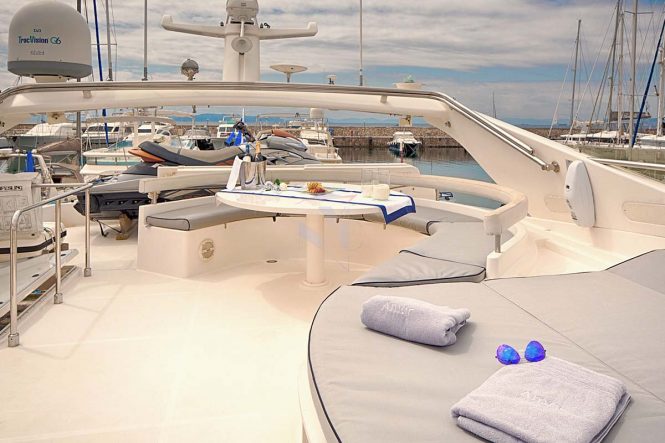 Flybridge sunpads and alfresco dining aboard luxury yacht AMOR