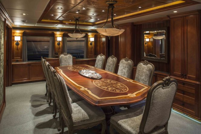 Formal dining room aboard luxury yacht UNBRIDLED