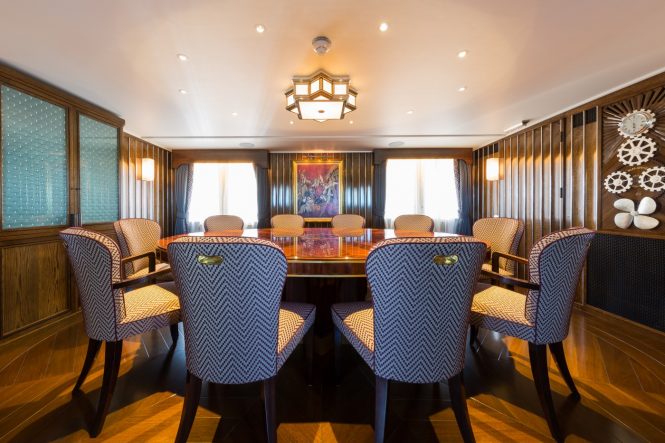 Formal dining room aboard motor yacht MALAHNE. Photo credit: Jeff Brown