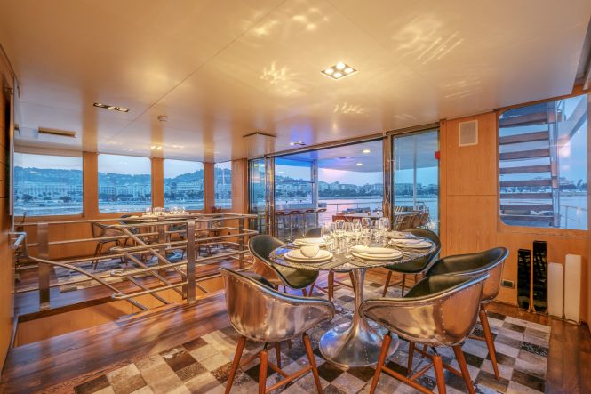 Luxury yacht ALTER EGO - Formal dining area looking aft
