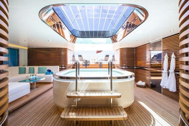 Luxury yacht AQuiJo beachclub Jacuzzi and gym equipment - Photo by Stuart Pearce