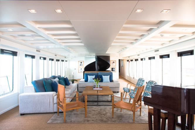 Main salon with grand piano aboard motor yacht MENORCA. Photo credit Mare e Terra