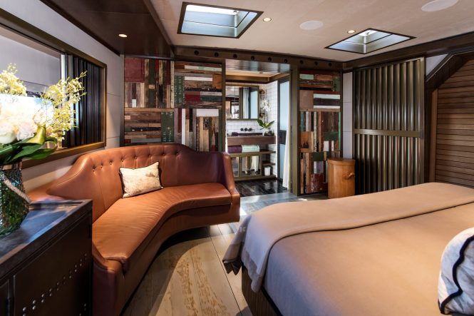 Owner's suite looking forward into the full-beam bathroom aboard PINK GIN VI