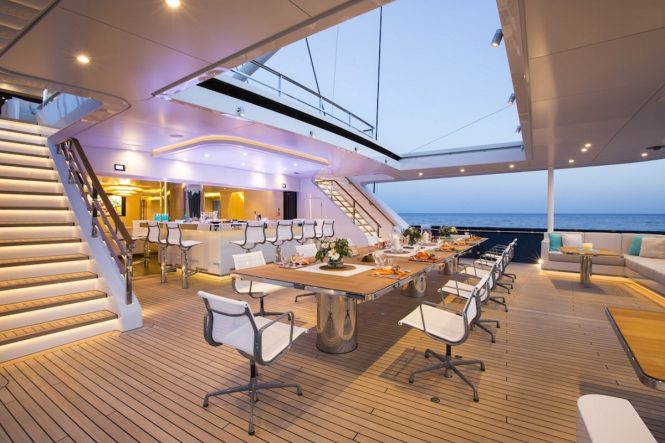 Sailing yacht AQuiJo - Alfresco dining and bar on the main deck. Photo by Stuart Pearce