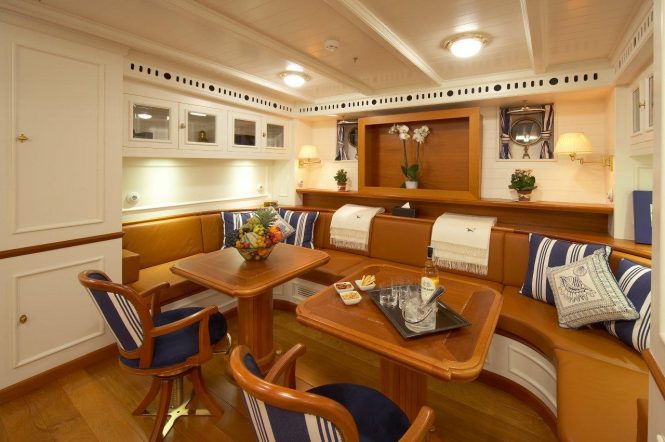 Salon adjecent to the formal dining area aboard luxury yacht GERMANIA NOVA