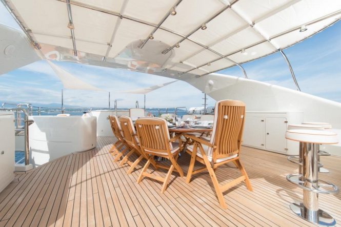 Sundeck alfresco dining abaord motor yacht BLUE VISION