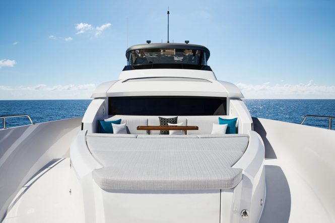 Sunpads and seating on the bow of motor yacht M90 from Hatteras