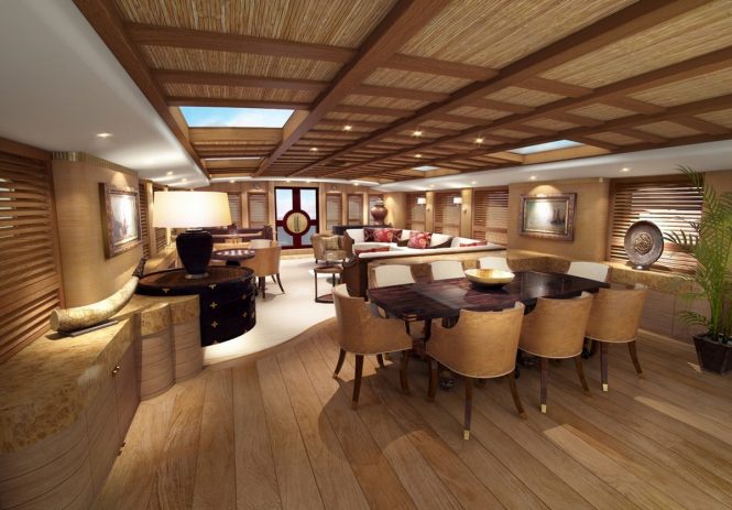 The open-plan salon and formal dining area aboard luxury ketch ZANZIBA