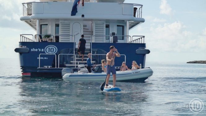 Luxury yacht SHE'S A 10 - Aft view of swim platform with tender