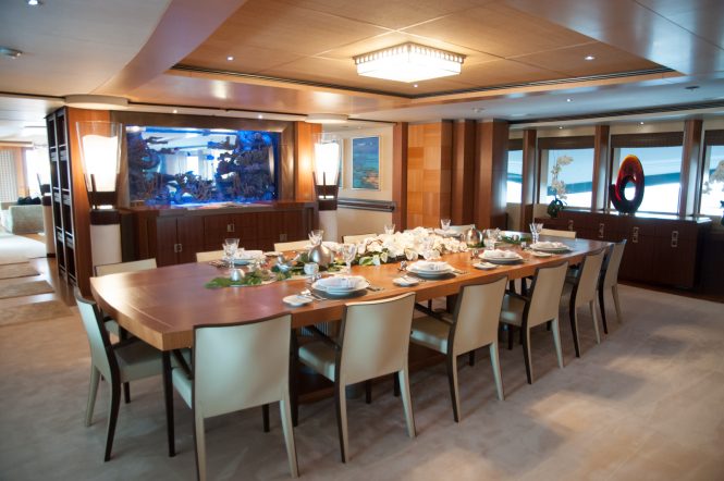 MYS 2017 ANASTASIA by Oceanco dining room with table setting and aquarium