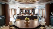 Oceanco yacht Anastasia at MYS 2017 - upper deck saloon with games : dining table and seating area