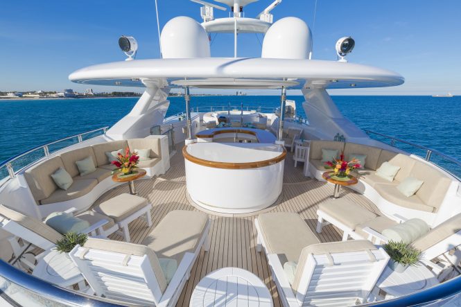 Sundeck drinking and dining aboard luxury yacht ALLEGRIA
