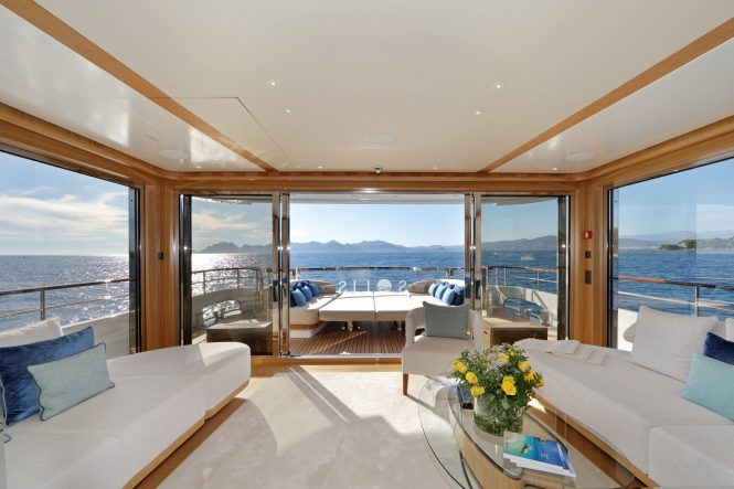 Huge windows and great indoor outdoor flow between main saloon area and aft exterior relaxation area on the main deck