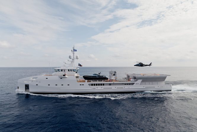 Luxury explorer superyacht support vessel GAME CHANGER by DAMEN with helicopter